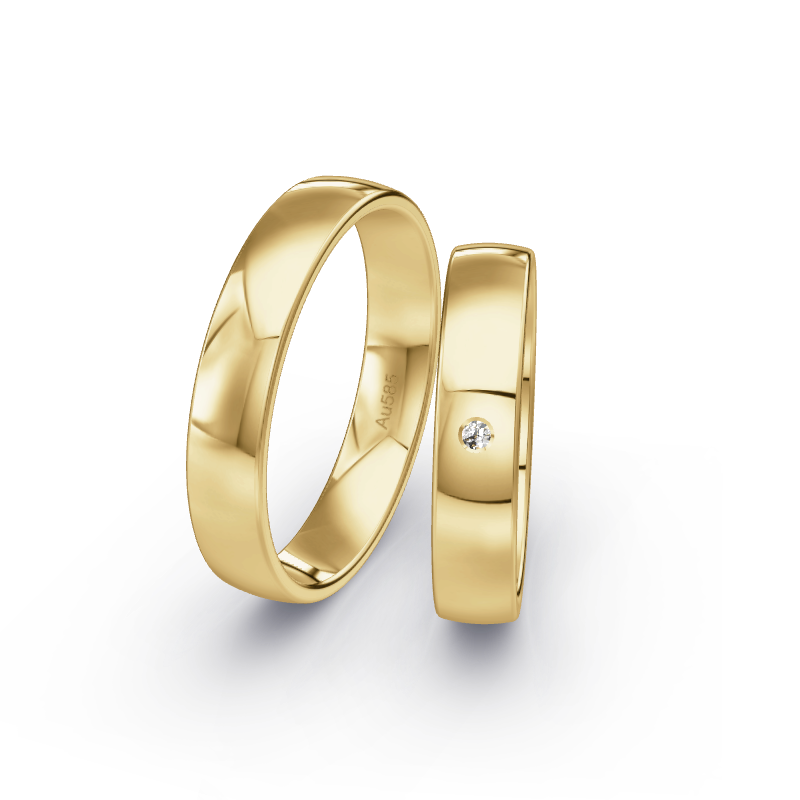 Hochwertige Trauringe aus Gelbgold 585. Die Oberfläche ist Poliert.
            Der Damenring hat einen Steinbesatz von 0.015 Brillianten.