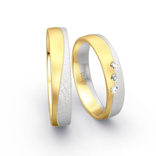 Trauringe Gelbgold 333 / Weissgold 333 mit 0.045 ct. Brillanten GR15134