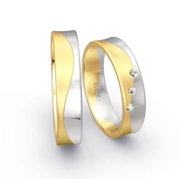 Trauringe Gelbgold 333 / Weissgold 333 mit 0.03 ct. Brillanten GR15431