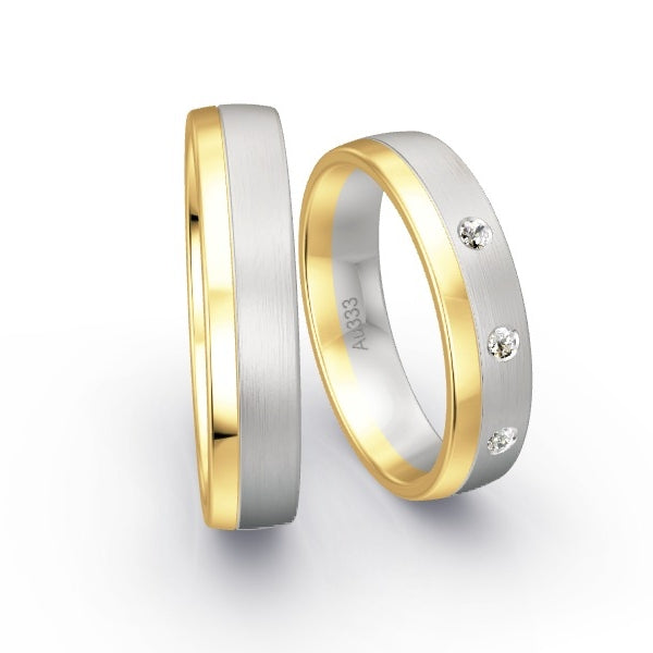 Trauringe Gelbgold 333 / Weissgold 333 mit 0.06 ct. Brillanten GR15644
