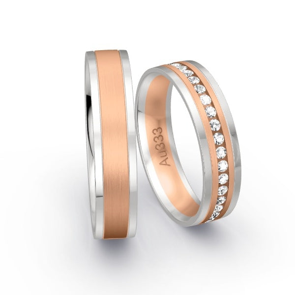Trauringe Weissgold 333 / Rotgold 333 mit 0.555 ct. Brillanten GR24503