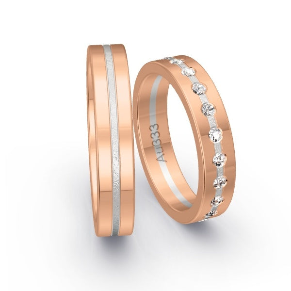 Trauringe Rotgold 333 / Weissgold 333 mit 0.22 ct. Brillanten GR24700