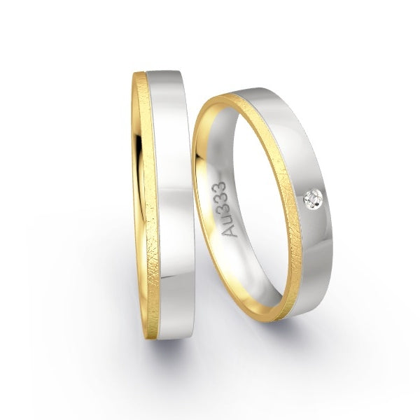 Trauringe Gelbgold 333 / Weissgold 333 mit 0.015 ct. Brillanten GR25093