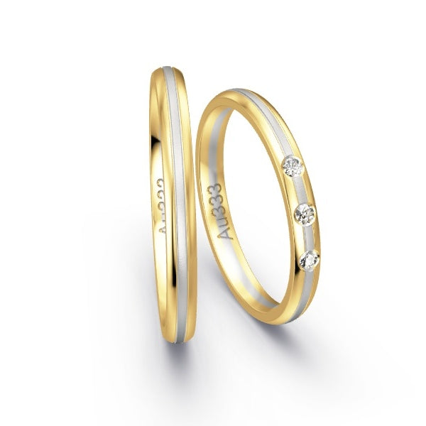 Trauringe Gelbgold 333 / Weissgold 333 mit 0.06 ct. Brillanten GR25108