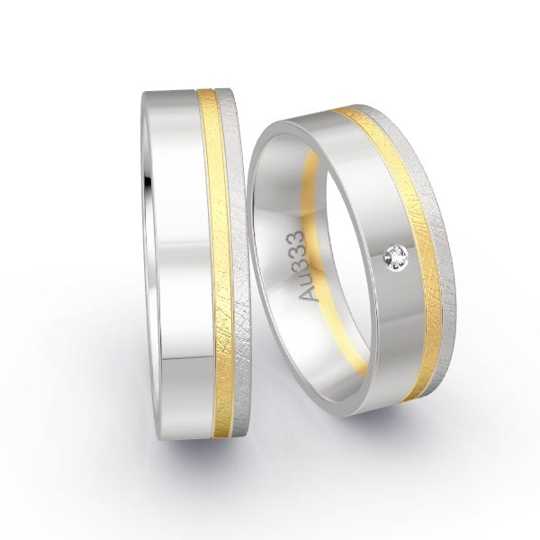 Trauringe Weissgold 333 / Gelbgold 333 mit 0.015 ct. Brillanten GR25273