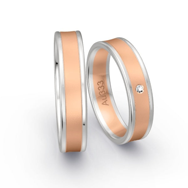 Trauringe Weissgold 333 / Rotgold 333 mit 0.015 ct. Brillanten GR25442