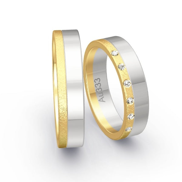 Trauringe Gelbgold 333 / Weissgold 333 mit 0.06 ct. Brillanten GR25486