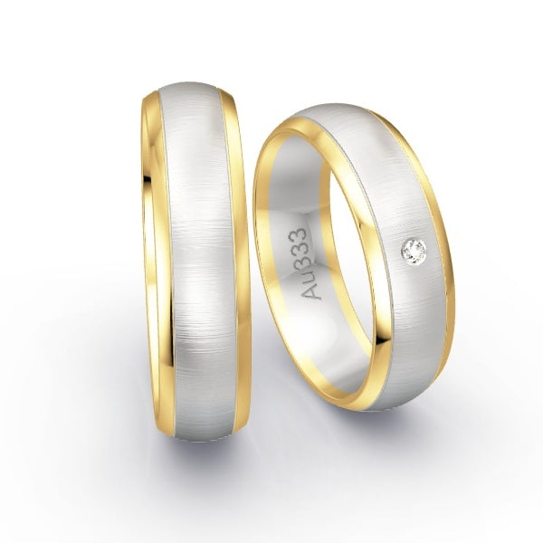 Trauringe Gelbgold 333 / Weissgold 333 mit 0.015 ct. Brillanten GR25516