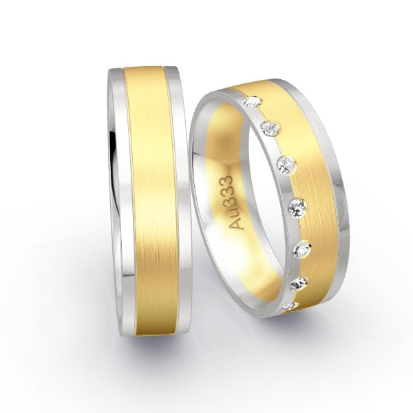 Trauringe Weissgold 333 / Gelbgold 333 mit 0.105 ct. Brillanten GR25620