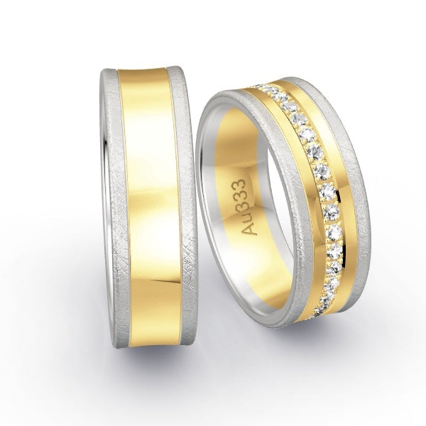 Trauringe Weissgold 333 / Gelbgold 333 mit 0.555 ct. Brillanten GR25708