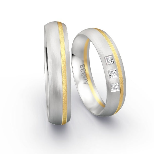 Trauringe Weissgold 333 / Gelbgold 333 mit Prinzessen GR25833