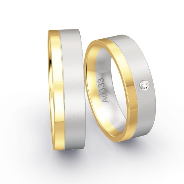 Trauringe Gelbgold 333 / Weissgold 333 mit 0.02 ct. Brillanten GR26000